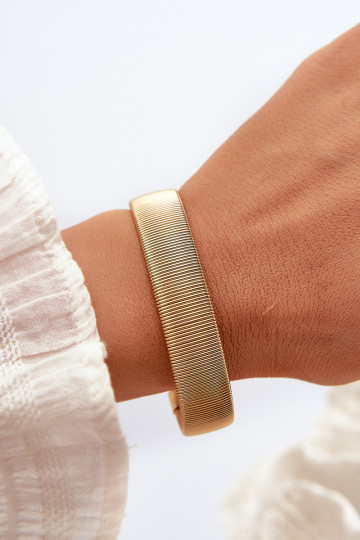 Elastyczna Un bracelet Féminin en acier inoxydable couleur dorée