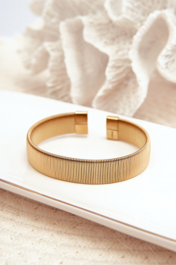 Elastyczna Un bracelet Féminin en acier inoxydable couleur dorée 2