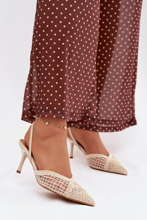 des sandales avec des éléments ajourés avec des talons fins couleur ivoire Hanelis