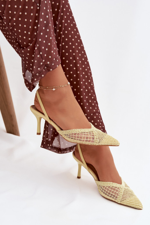 Sandales „Hanelis“ couleur jaune avec éléments ajourés et talons fins