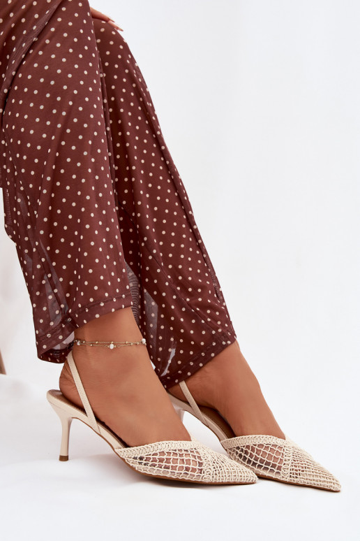 Sandales „Hanelis“ couleur ivoire avec éléments ajourés et talons fins