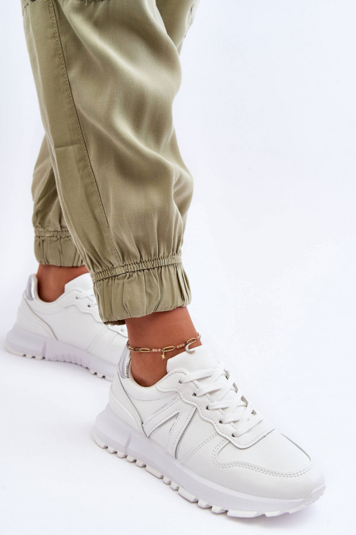 Peau Féminin baskets couleur blanche Kabama