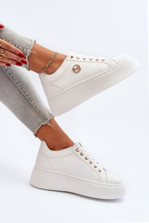 Faible Chaussures modèle baskets Féminin avec une plateforme couleur blanche Telirra