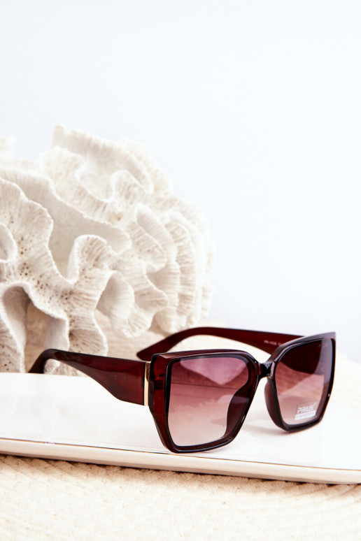 Des lunettes de soleil FémininFiltrem UV marron foncé