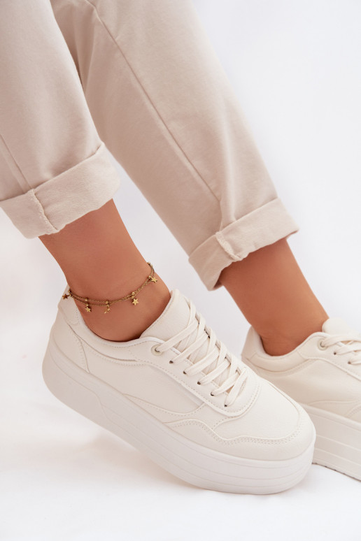 Chaussures modèle baskets Féminin avec une plateforme couleur ivoire Feressa