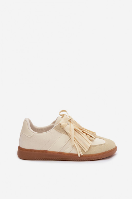 Chaussures modèle baskets Féminin avec des franges couleur jaune Dorivelle