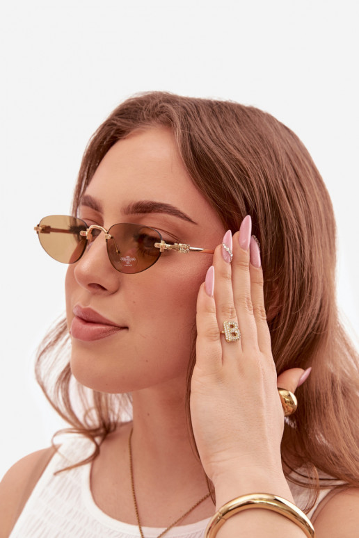 Des lunettes de soleil Féminin marron