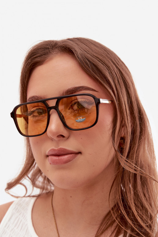 Des lunettes de soleil FémininFiltrem UV Noir et-couleur jaune