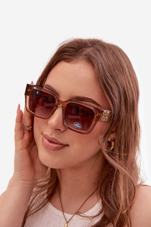 Des lunettes de soleil Féminin marron
