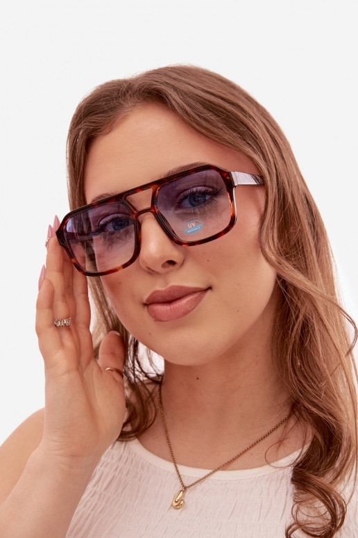 Des lunettes de soleil Féminin brun-couleur bleue