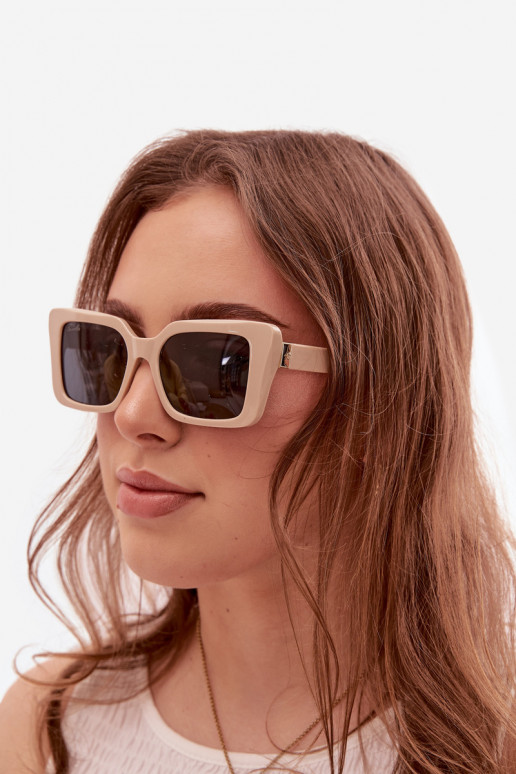 Des lunettes de soleil Féminin beige