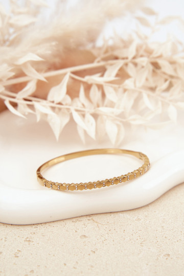 Un bracelet FémininPetitmet des zircons Stal NierdzeÀna couleur dorée 2