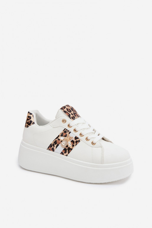 Chaussures modèle baskets Féminin avec une plateformePrzypinką couleur blanche avec des motifs en fourrure de léopard Palvessa