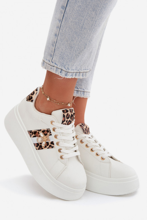 Chaussures modèle baskets Féminin avec une plateformePrzypinką couleur blanche avec des motifs en fourrure de léopard Palvessa