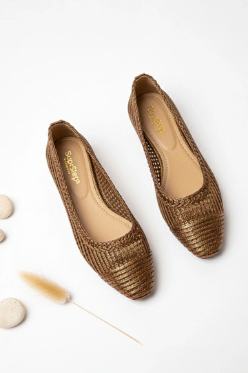 Ballerines brunes ajourées... 2