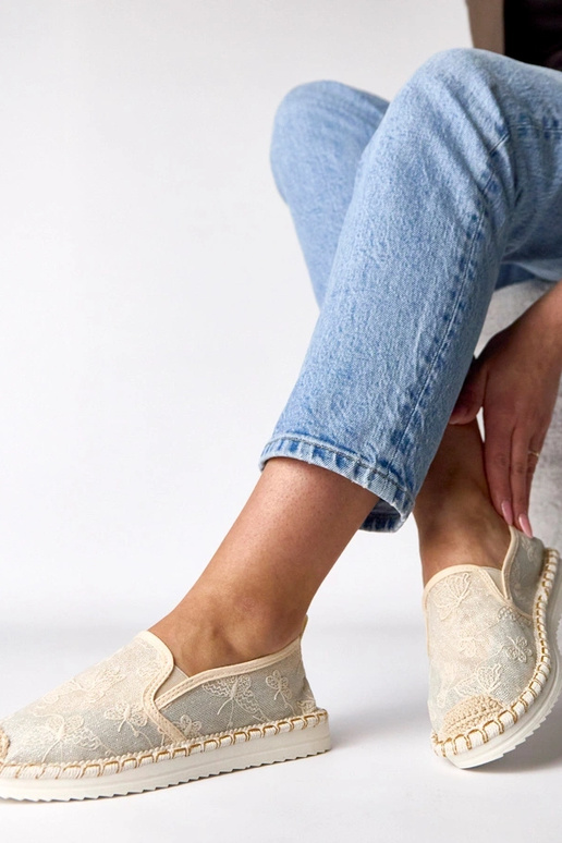 Espadrilles couleur sable ornées de...