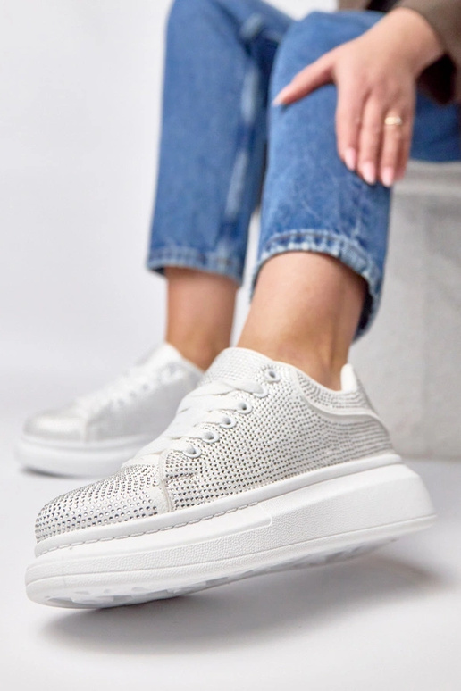 Baskets plateforme blanches ornées de...