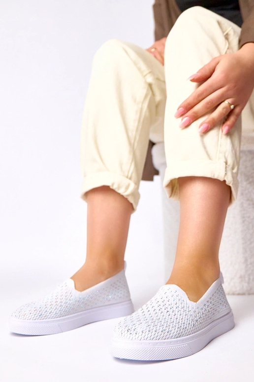 Baskets en textile blanches avec des...