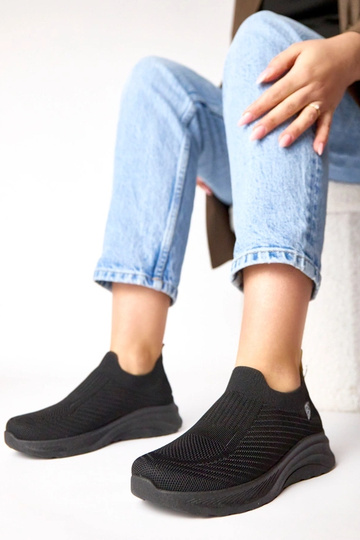 Baskets en textile noires à...