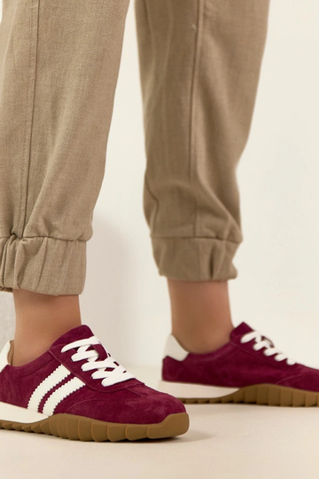 Baskets en cuir bordeaux...