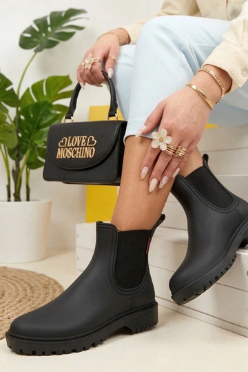 Bottes en caoutchouc noires...