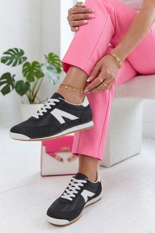 Baskets noires avec éléments blancs Saga