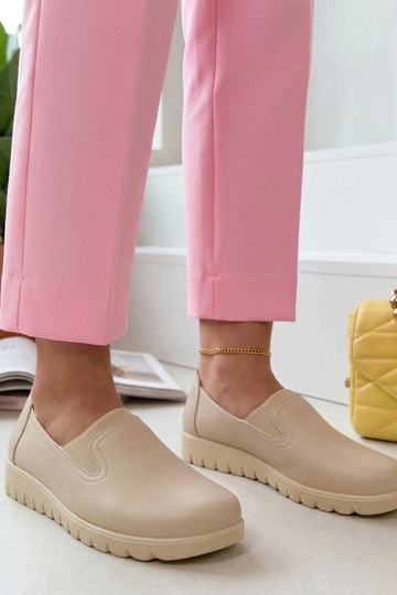 Bottines en sable à talon...