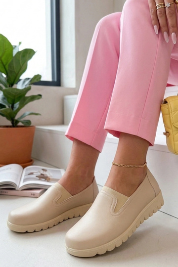 Bottines en sable à talon... 2