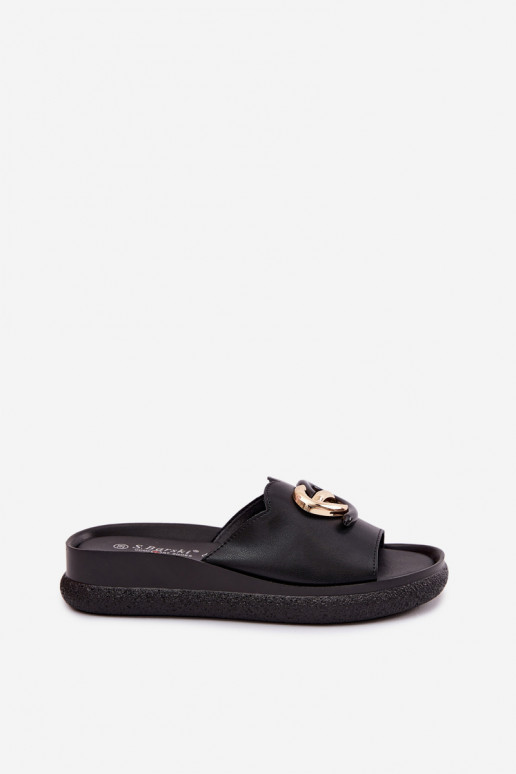 Chaussons en cuir avec détails décoratifs en noir