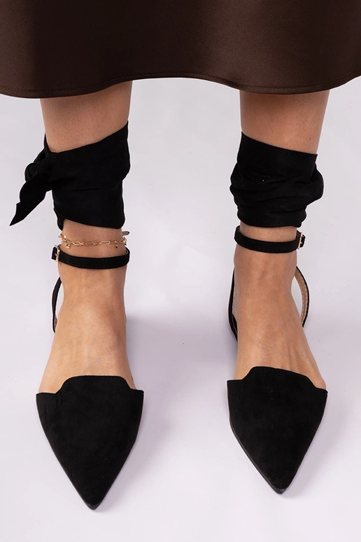 Mules noires à talon plat Mella