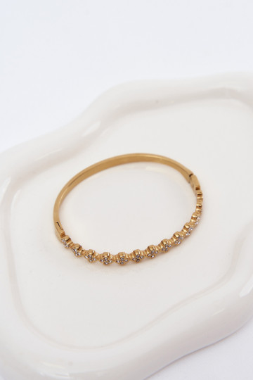 Bracelet doré pour femme avec des pierres scintillantes