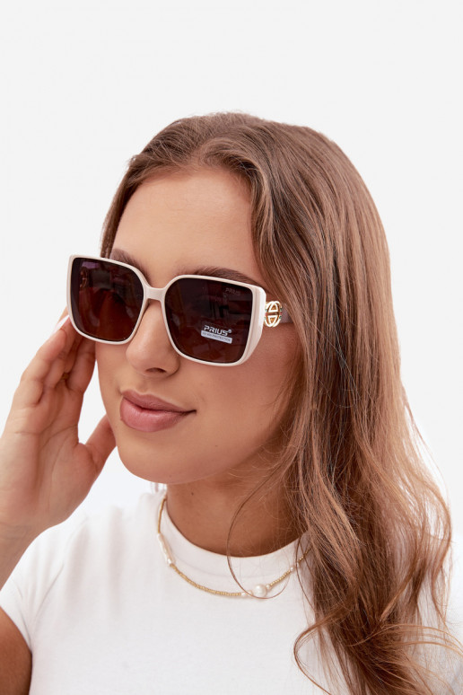 Lunettes de soleil avec des détails décoratifs en couleur sable