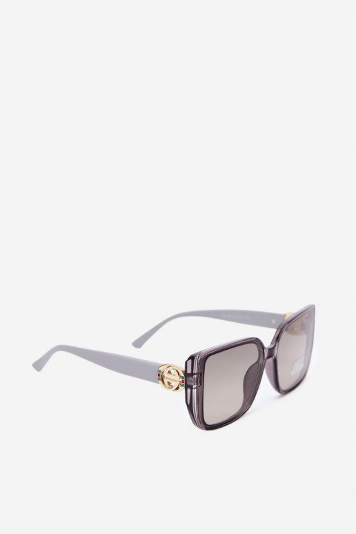 Lunettes de soleil avec des détails décoratifs en couleur grise