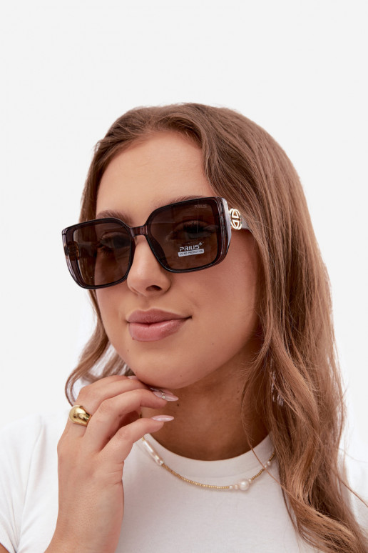 Lunettes de soleil avec des détails décoratifs en couleur grise