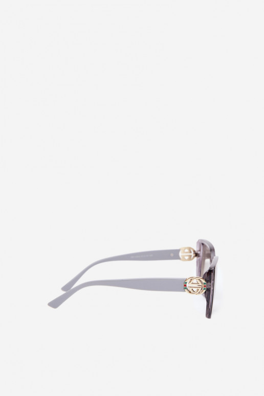 Lunettes de soleil avec des détails décoratifs en couleur grise
