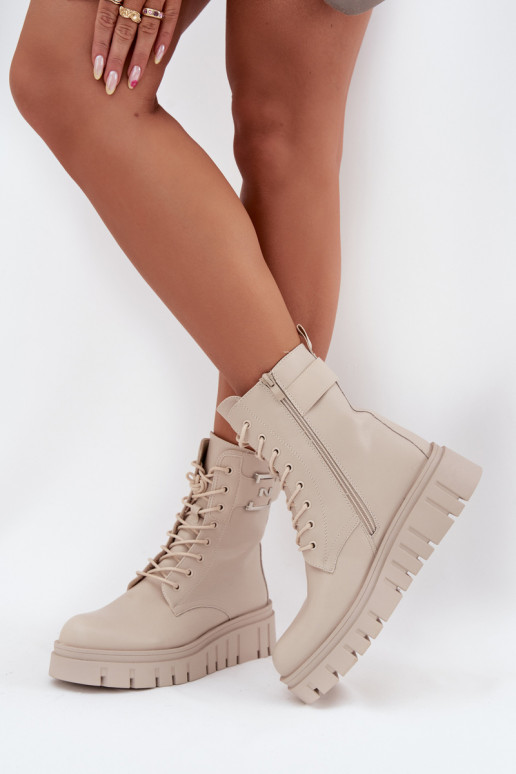 Bottines isolées avec plateforme et détails décoratifs en ivoire Lyrana