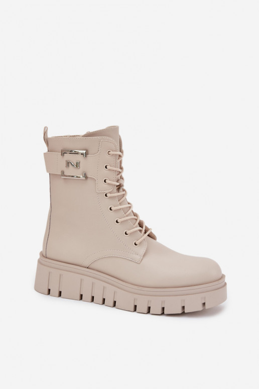 Bottines isolées avec plateforme et détails décoratifs en ivoire Lyrana