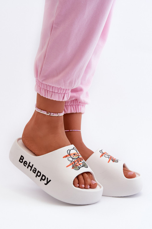 Chaussons pour femmes sur une semelle épaisse avec un ours en peluche en blanc clair Serefina