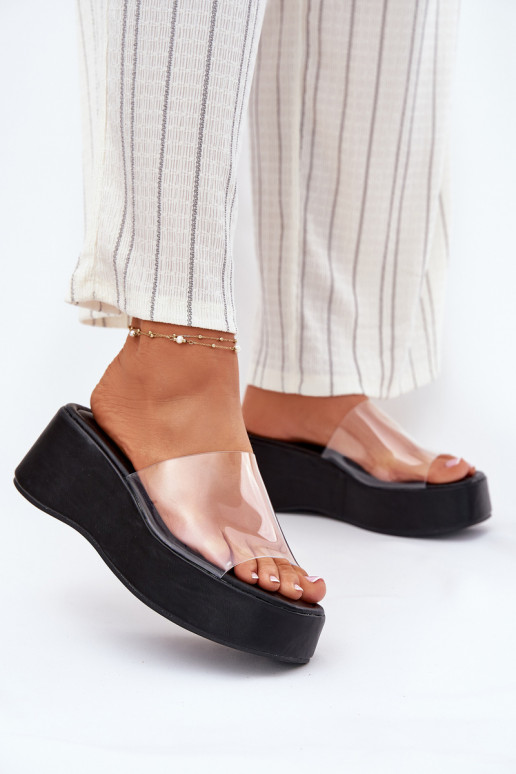Chaussons pour femmes noires avec des lanières transparentes sur la plateforme Meltiana