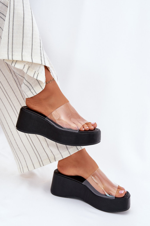 Chaussons pour femmes noires avec des lanières transparentes sur la plateforme Meltiana
