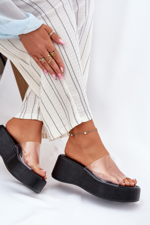 Chaussons pour femmes noires avec des lanières transparentes sur la plateforme Meltiana