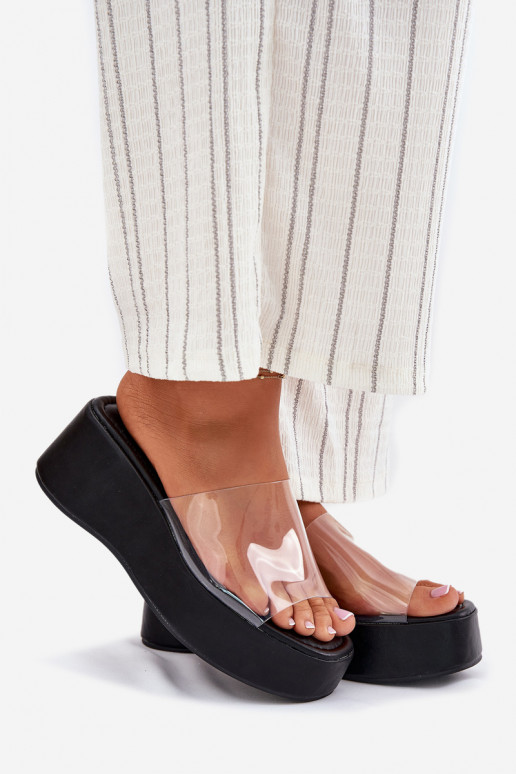 Chaussons pour femmes noires avec des lanières transparentes sur la plateforme Meltiana