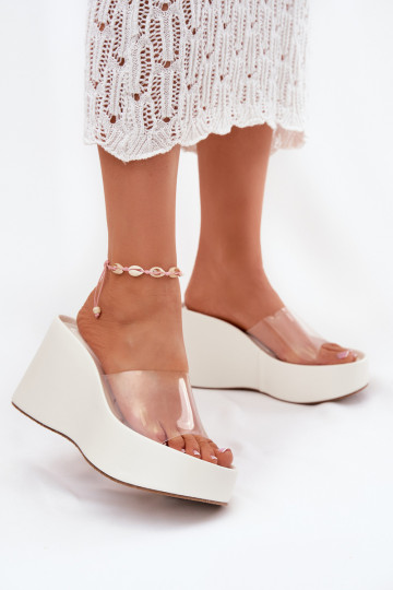 Chaussons pour femmes blancs avec des lanières transparentes sur la plateforme Zolretia