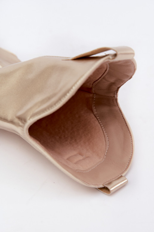 bottes hautes de style cowboy avec talons en couleur dorée