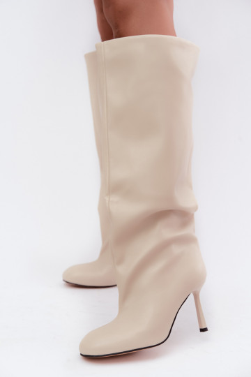 Bottes longues pour femmes à enfiler avec des talons fins en couleur ivoire Caliya