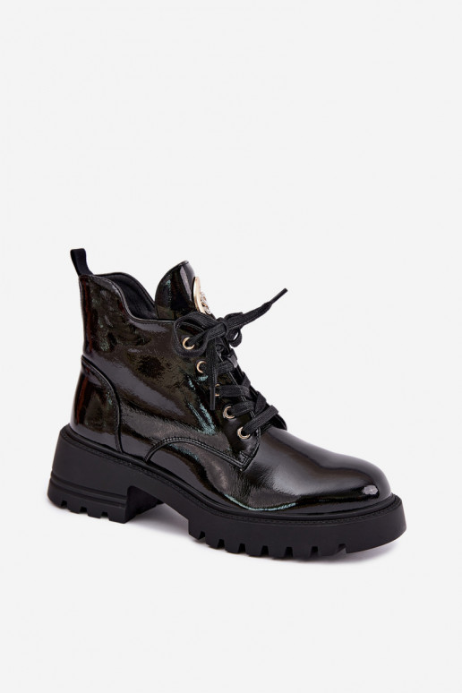 Bottines chaudes avec effet verni et détails dorés en noir Kavirae