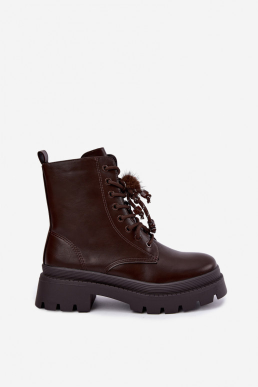 bottes isolées avec pompons en chocolat Faresse