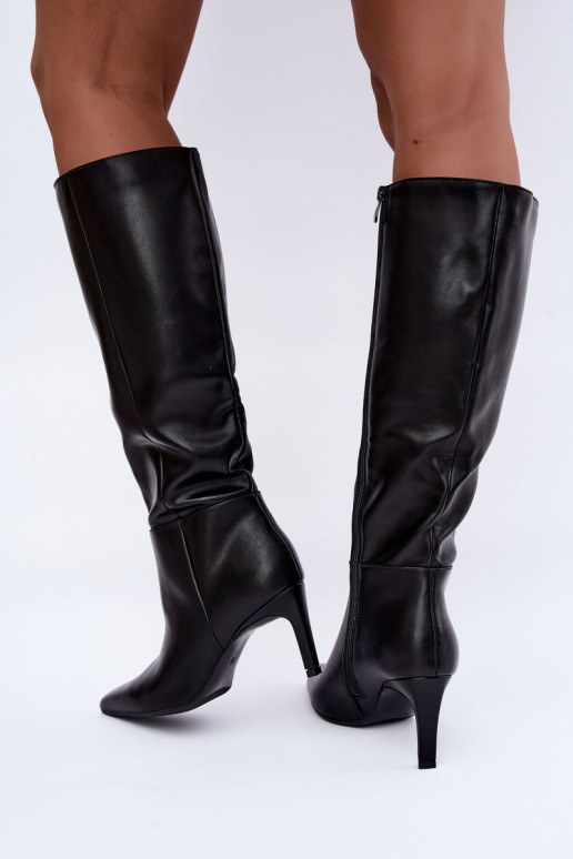 Bottes chaudes jusqu'au genou avec volants et talons en noir Rodeline