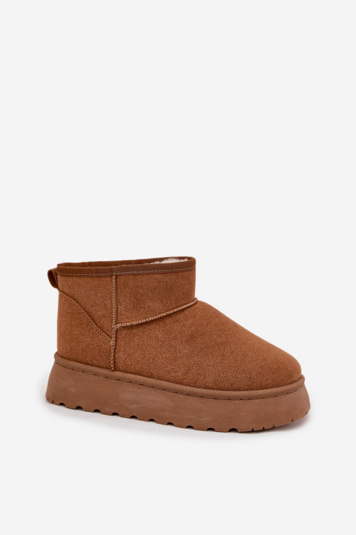 Chaussures beige avec accents noirs et semelle épaisse
