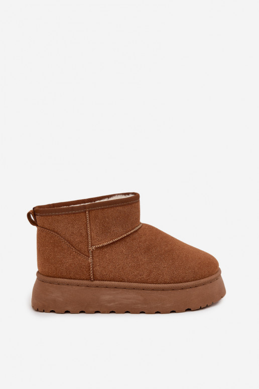 Chaussures beige avec accents noirs et semelle épaisse